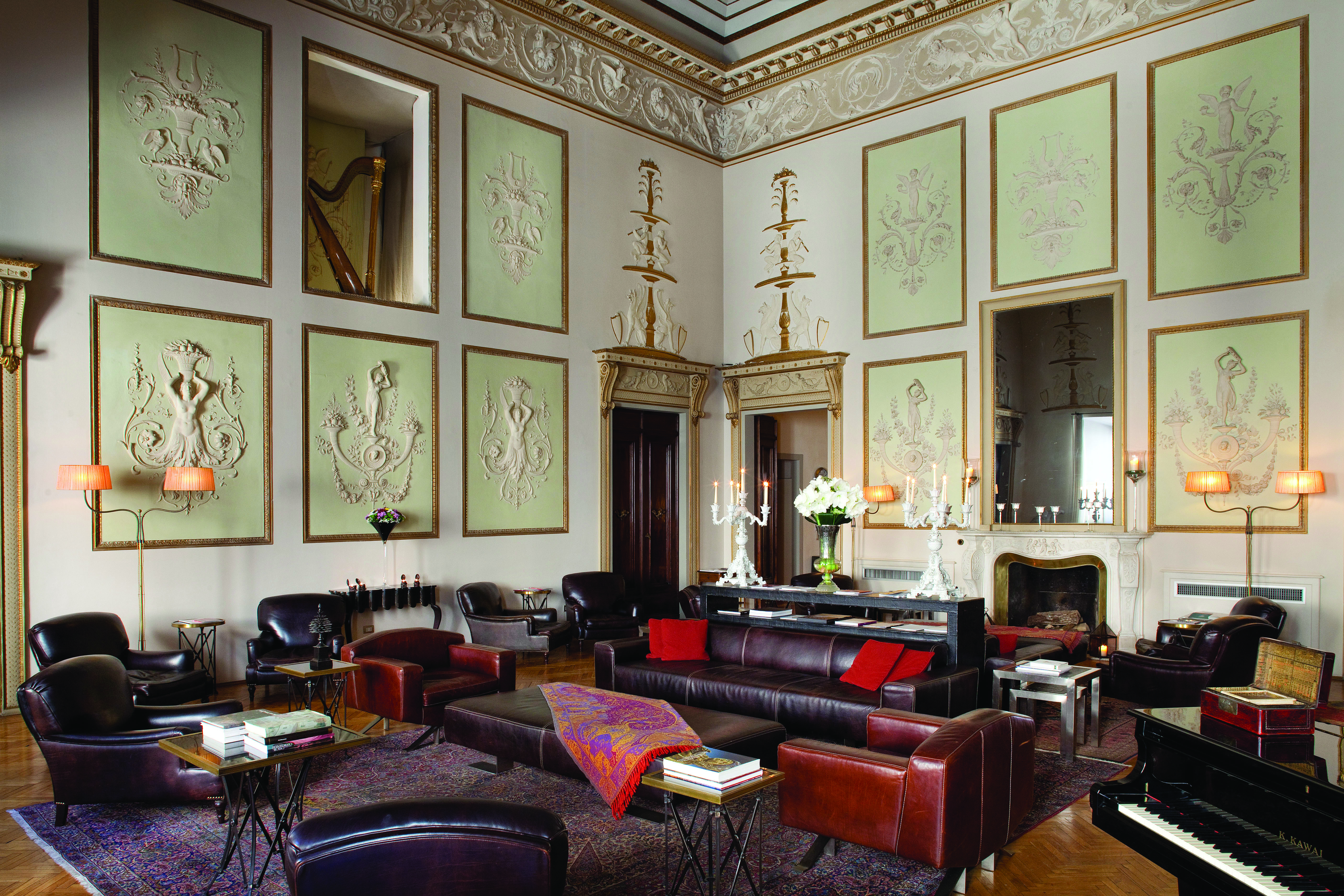 Relais Santa Croce Florence communal lounge indoor seating area sofas armchairs 