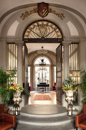 Relais Santa Croce Florence entrance hall baby grand piano marble floors