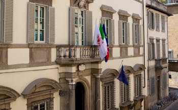 Relais Santa Croce Florence exterior hotel building flags Italian flag European union flag