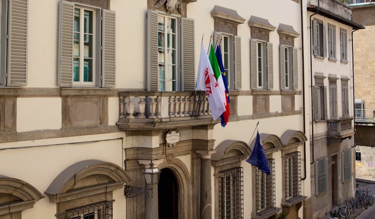 Relais Santa Croce Florence exterior hotel building flags Italian flag European union flag