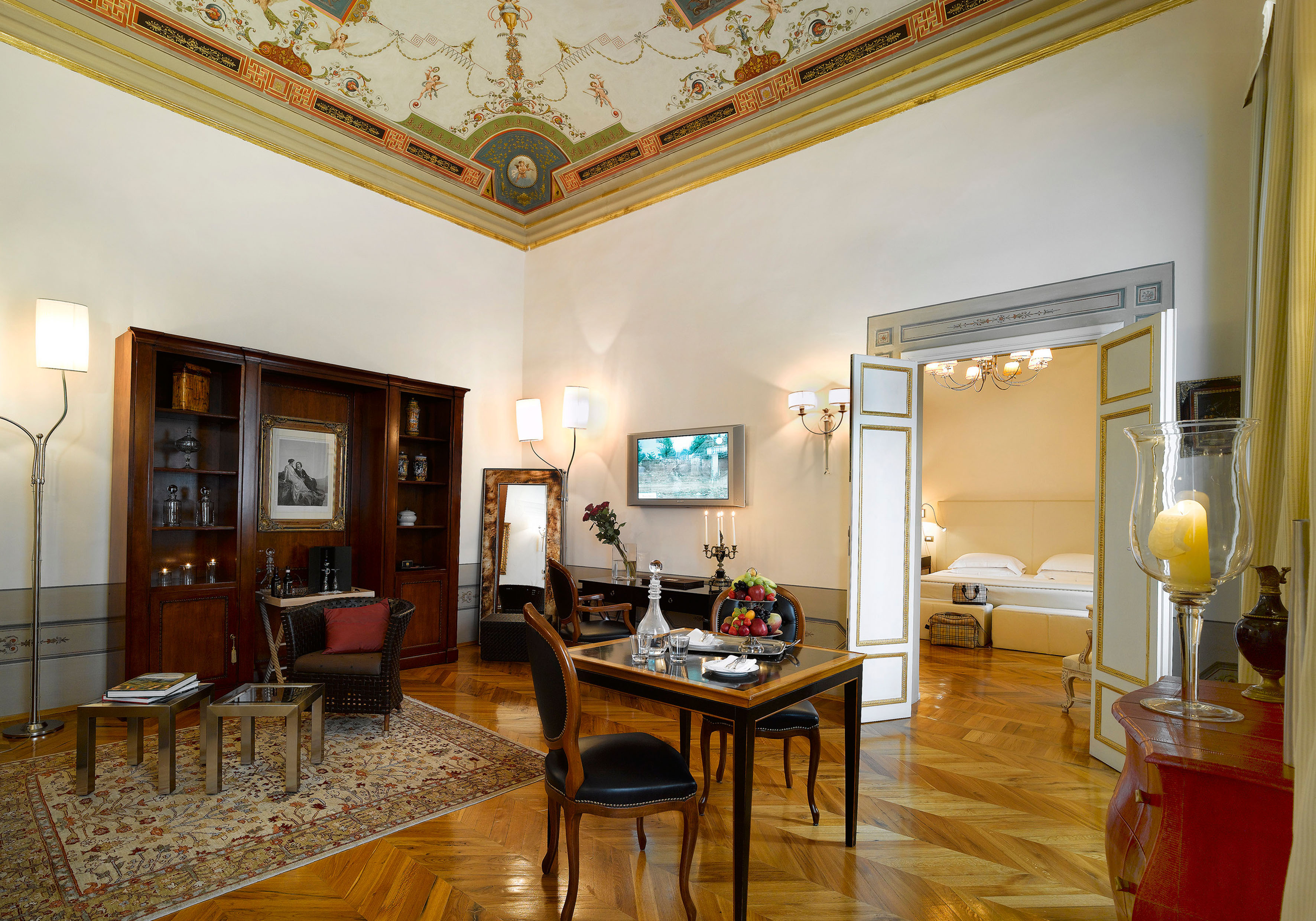Relais Santa Croce Florence royal suite lounge area leading to bedroom
