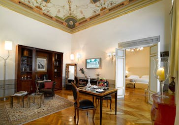 Relais Santa Croce Florence royal suite lounge area leading to bedroom