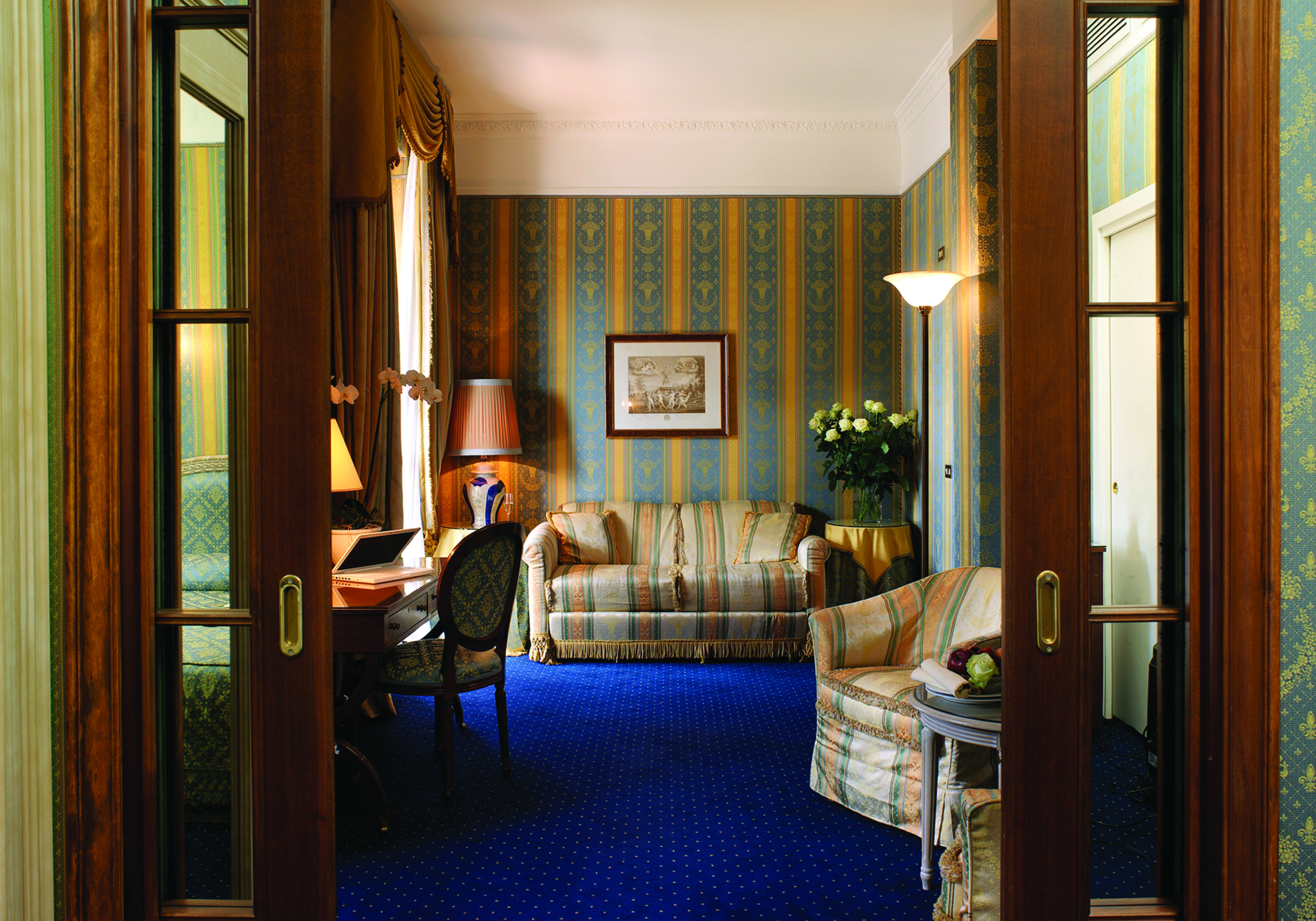 Hotel de la Ville Milan suite lounge area sofa armchair traditional décor