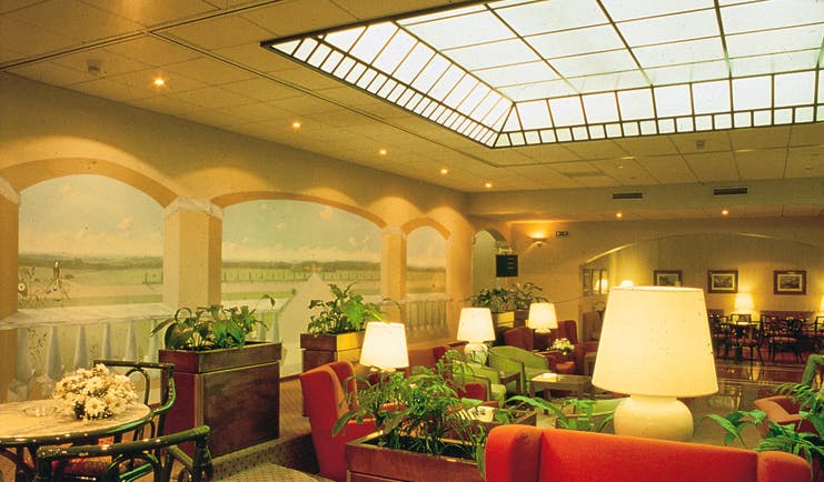 Palace Hotel Maria Luigia Parma lounge indoor communal seating area elegant décor