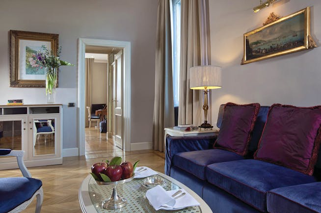 Aldrovandi Villa Borghese Rome executive suite lounge sofa door leading to bedroom