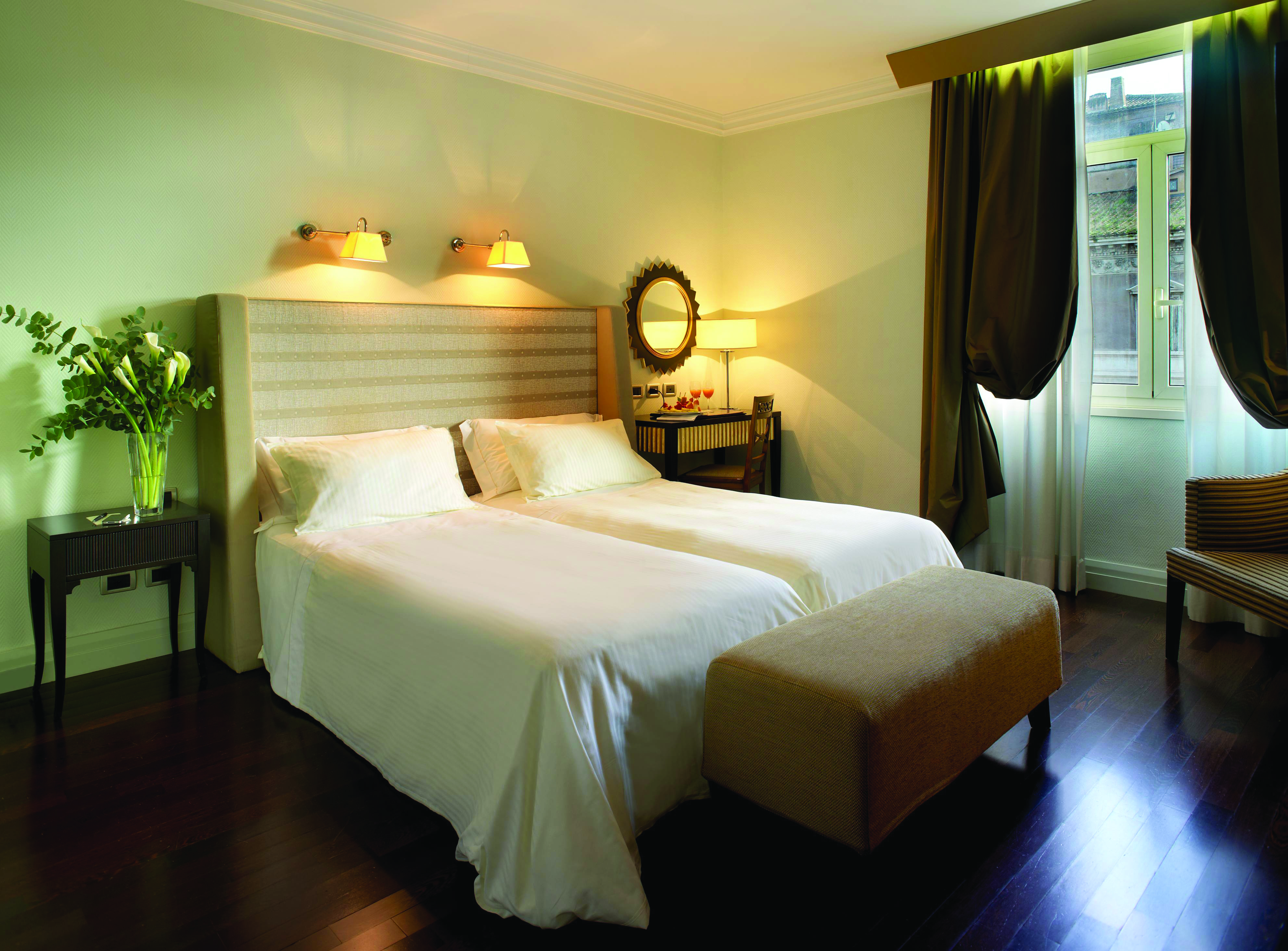 Bernini Bristol Rome twin room  wooden floors bedside tables