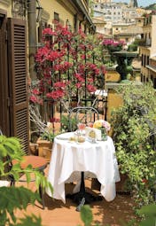 Hotel d'Inghilterra Rome balcony private seating and dining area shrubs and trees
