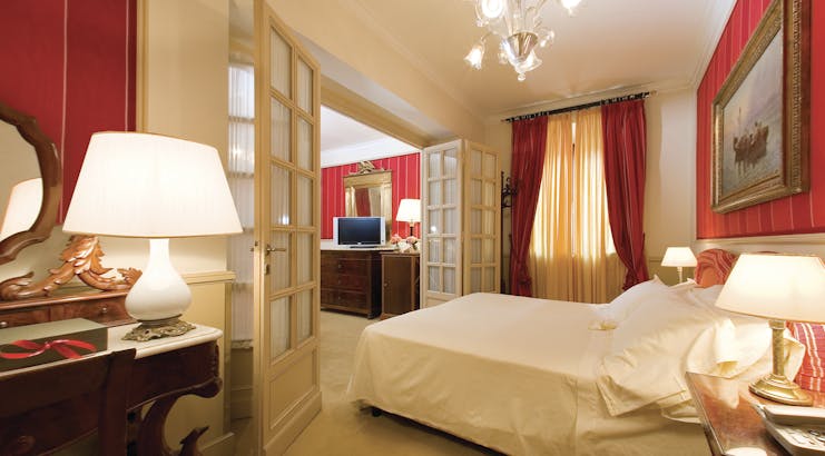 Hotel d'Inghilterra Rome executive junior suite bed lounge area ornate décor
