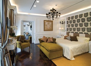 Hotel d'Inghilterra Rome executive suite bed armchairs elegant décor