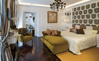 Hotel d'Inghilterra Rome executive suite bed armchairs elegant décor
