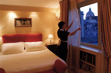 Hotel d'Inghilterra Rome junior suite bed maid city views