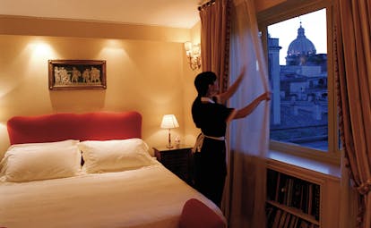 Hotel d'Inghilterra Rome junior suite bed maid city views