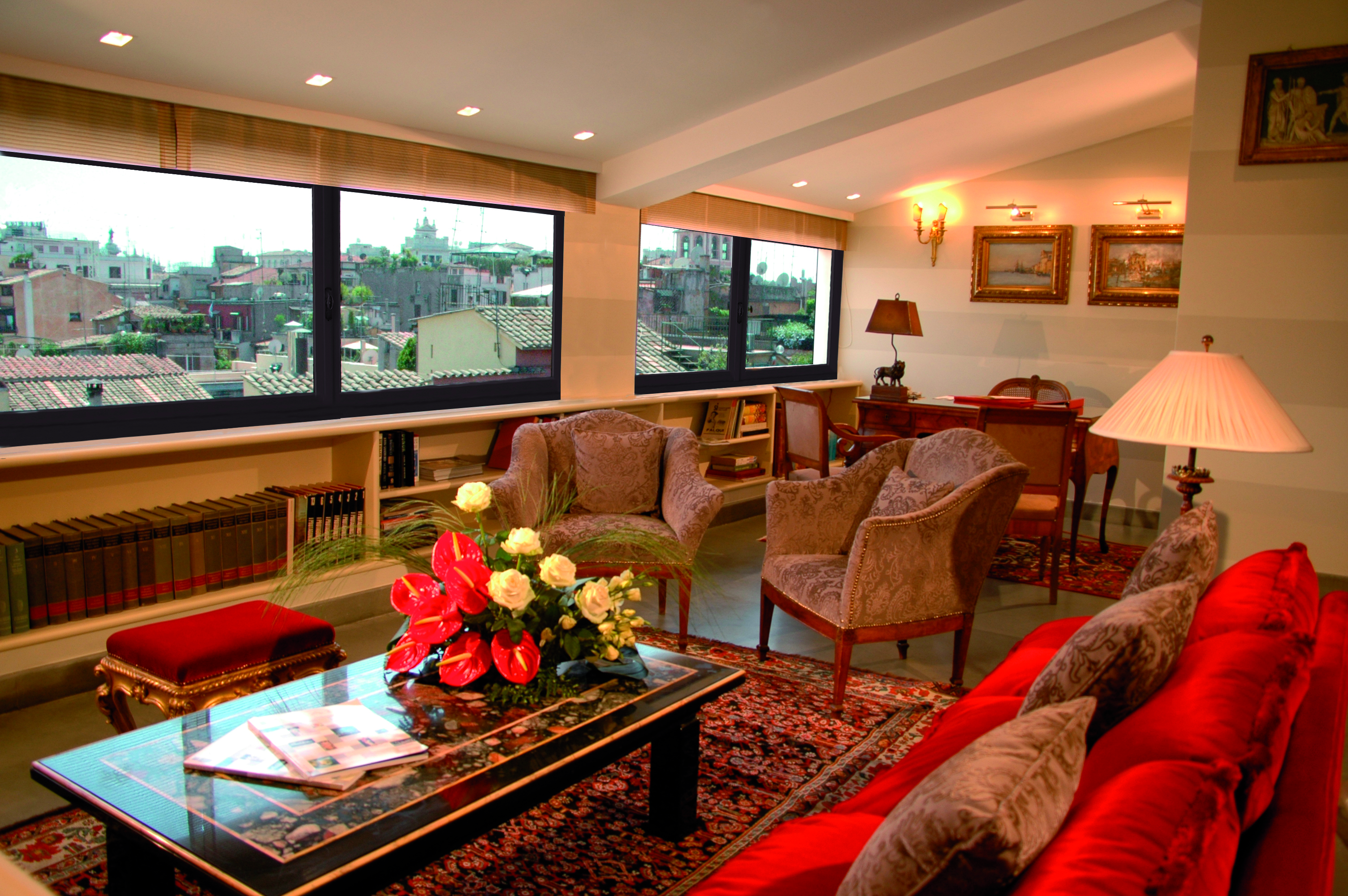 Hotel d'Inghilterra Rome penthouse lounge dining table sofas chairs ornate décor
