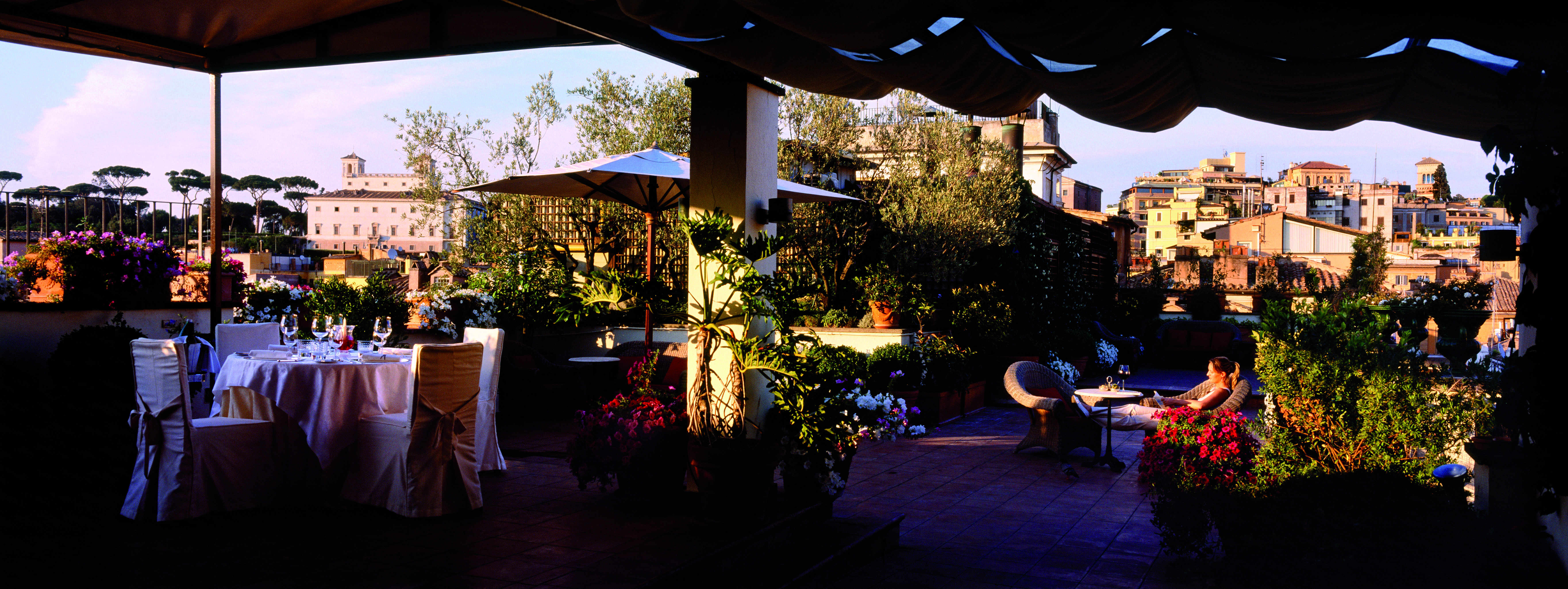 Hotel d'Inghilterra Rome outdoor dining plants umbrella city views