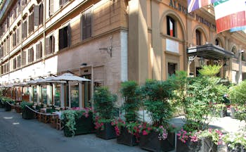 Hotel d'Inghilterra Rome street terrace outdoor dining area umbrellas