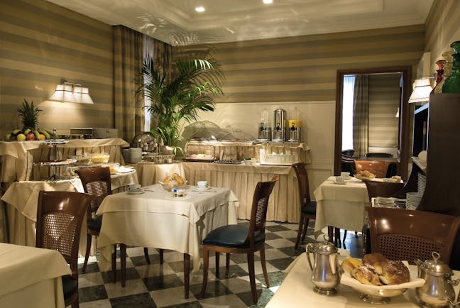 Hotel Mascagni Rome restaurant indoor dining area food modern décor