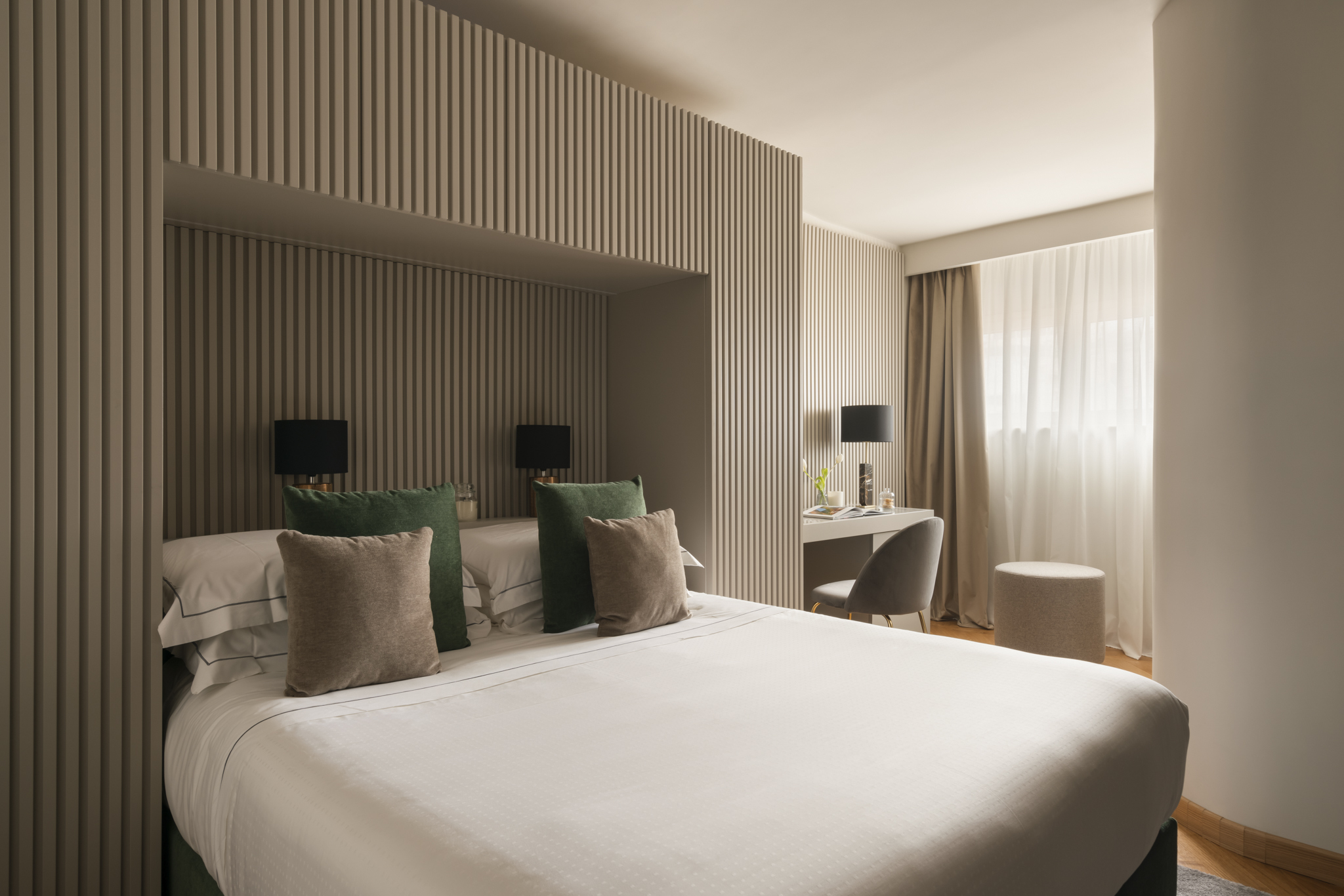 Palazzo Venere Superior Room with light, neutral colour palette and double bed
