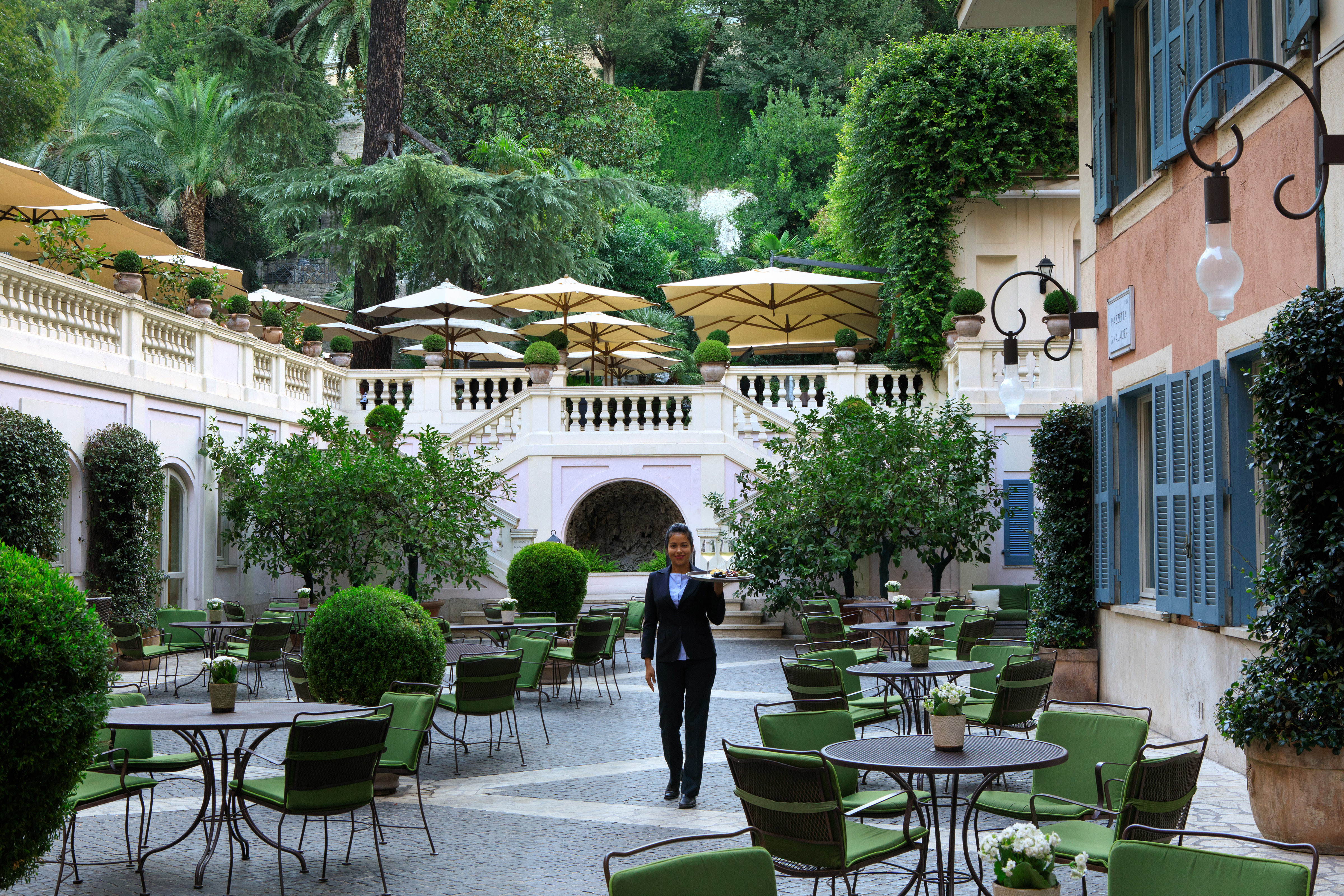 Hotel de Russie Rome shady square with chairs
