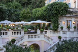 Hotel de Russie Rome terrace pink building and shades