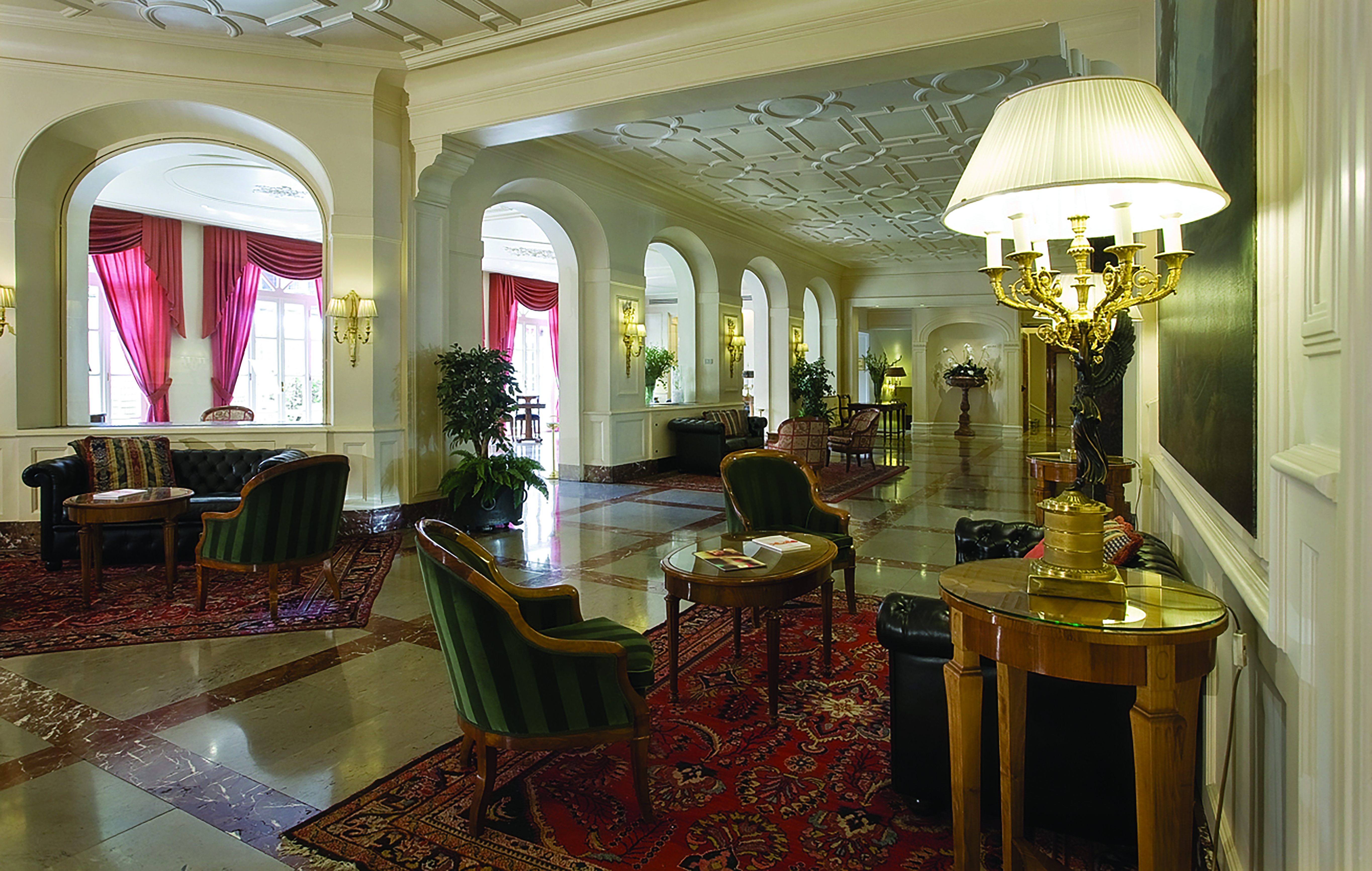Grand Hotel Sitea Turin lobby hall with seating and antique lights