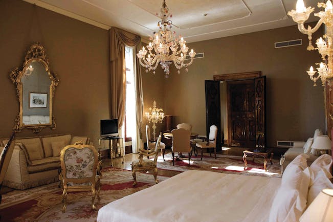 Ca Sagredo Venice presidential suite bed large lounge area candelabra