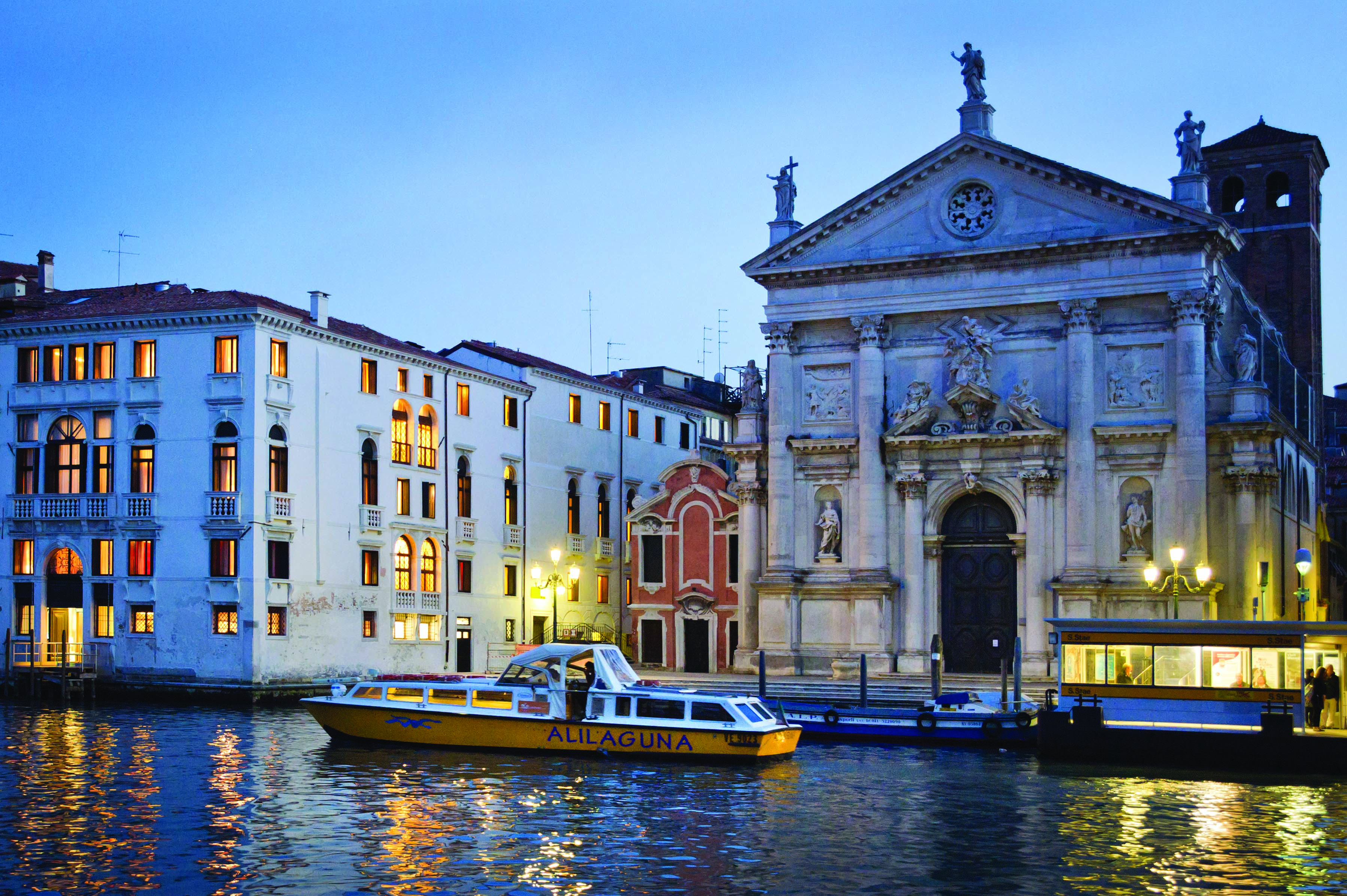 Palazzo Giovanelli Venice hotel building on canal front adjacent to church