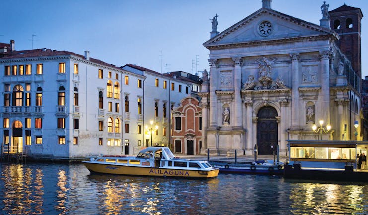 Palazzo Giovanelli Venice hotel building on canal front adjacent to church