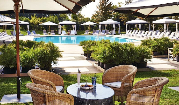 San Clemente Palace Venice pool sun loungers umbrellas outdoor dining area