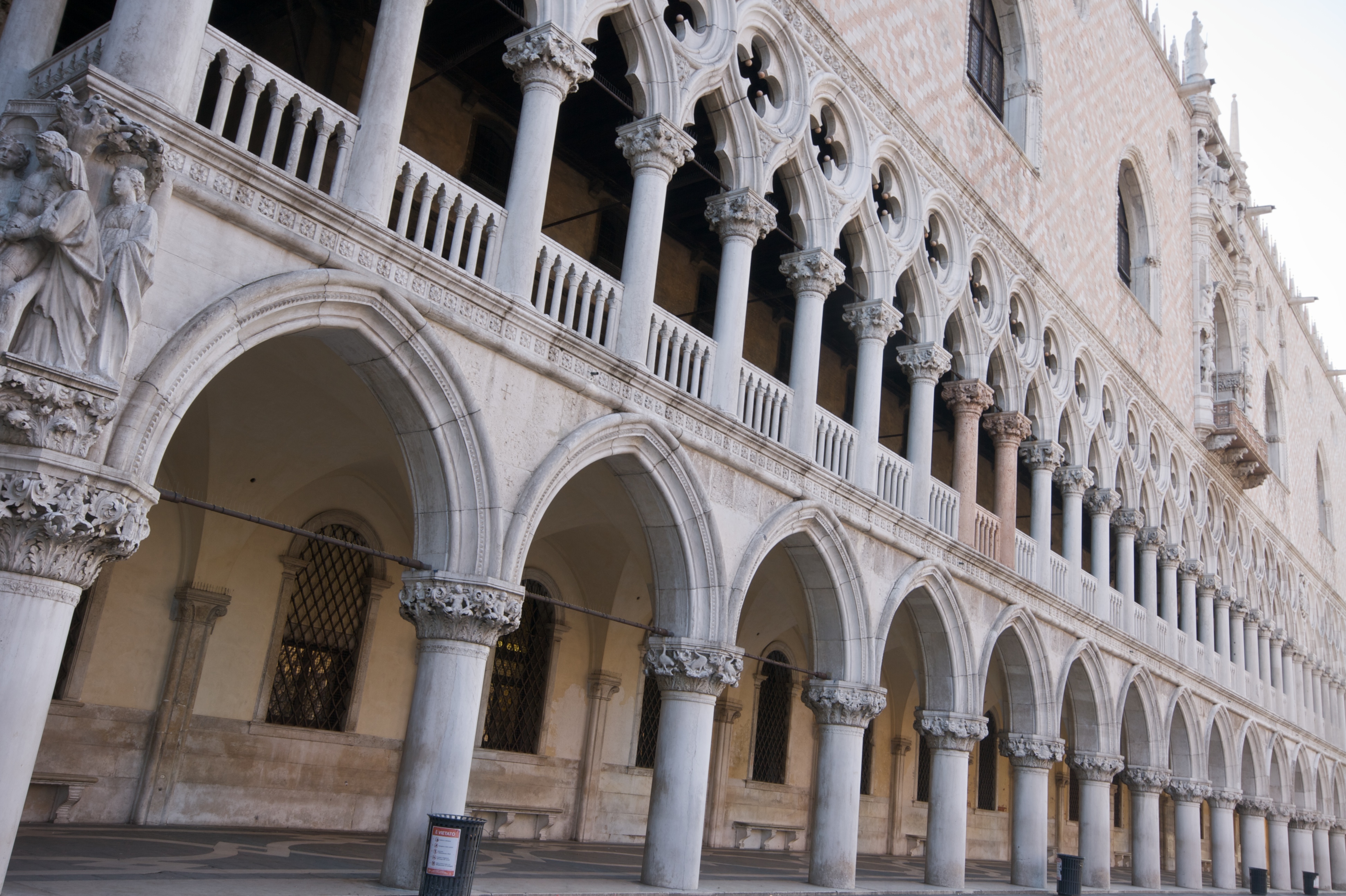 Pink marble ornate exterior of Doge's Palace in Venice
