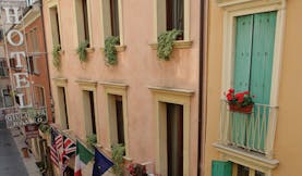 Hotel Giulietta e Romeo Verona hotel building exterior traditional architecture international flags