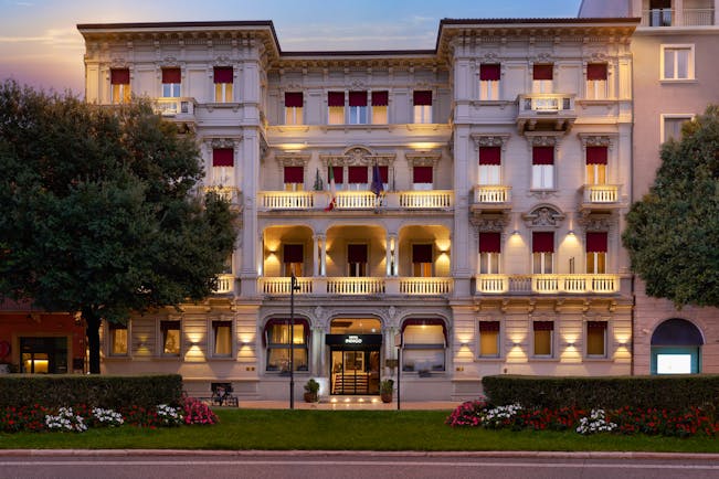 Grand exterior of hotel at night