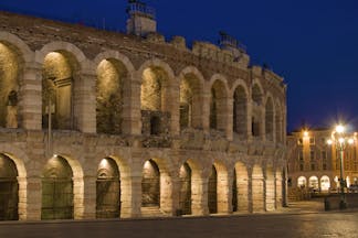 Roman amphitheatre at night with lights in Verona