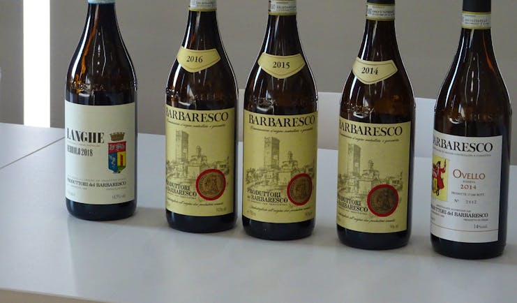 Row of red wine Barbaresco bottles