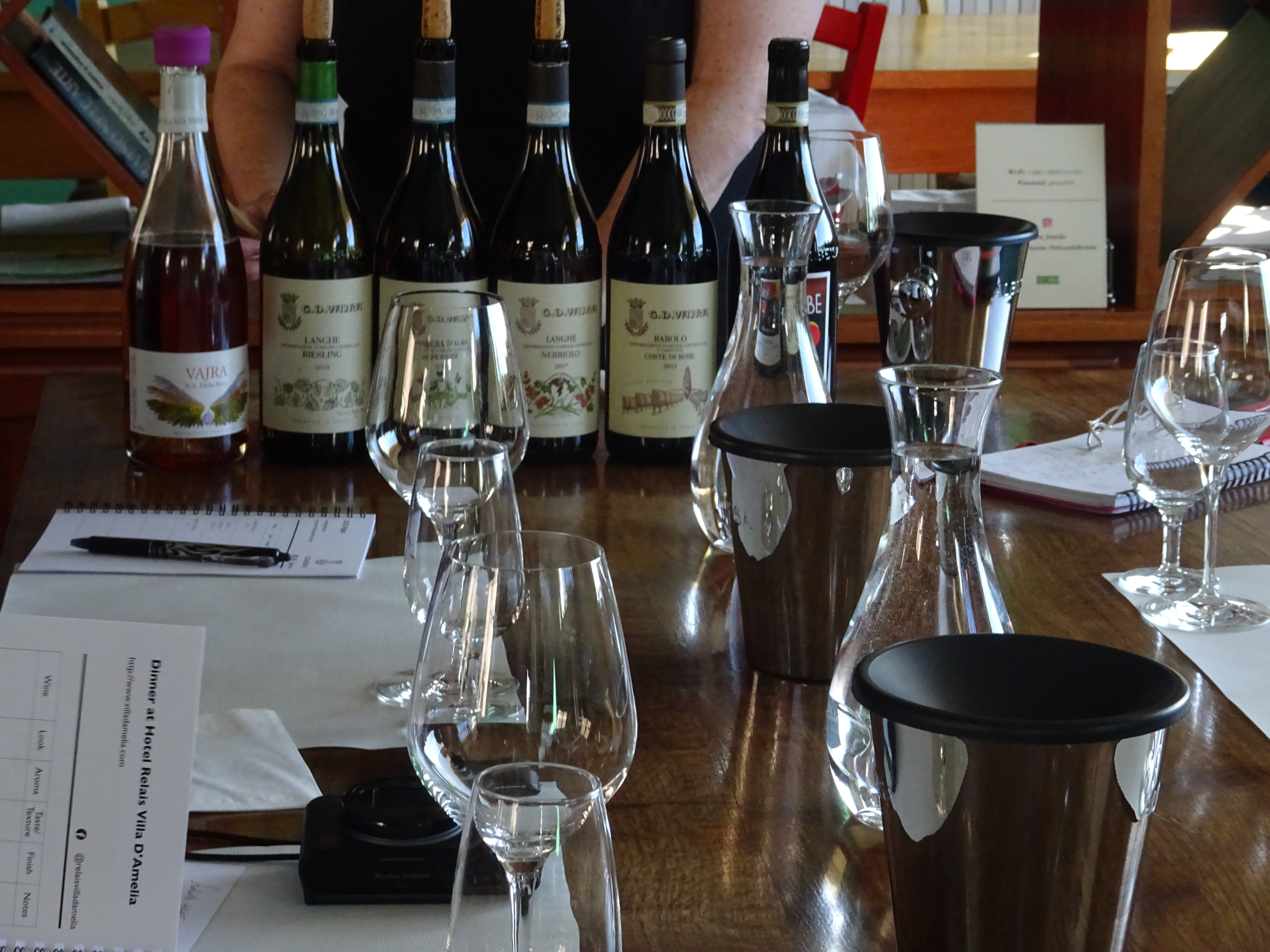 Bottles and glasses of wine on table for tasting