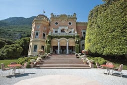 Villa Feltrinelli Lake Garda exterior hotel building steps leading to entrance outdoor seating