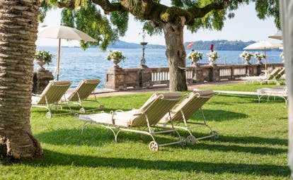 Grand Hotel Fasano garden by lake
