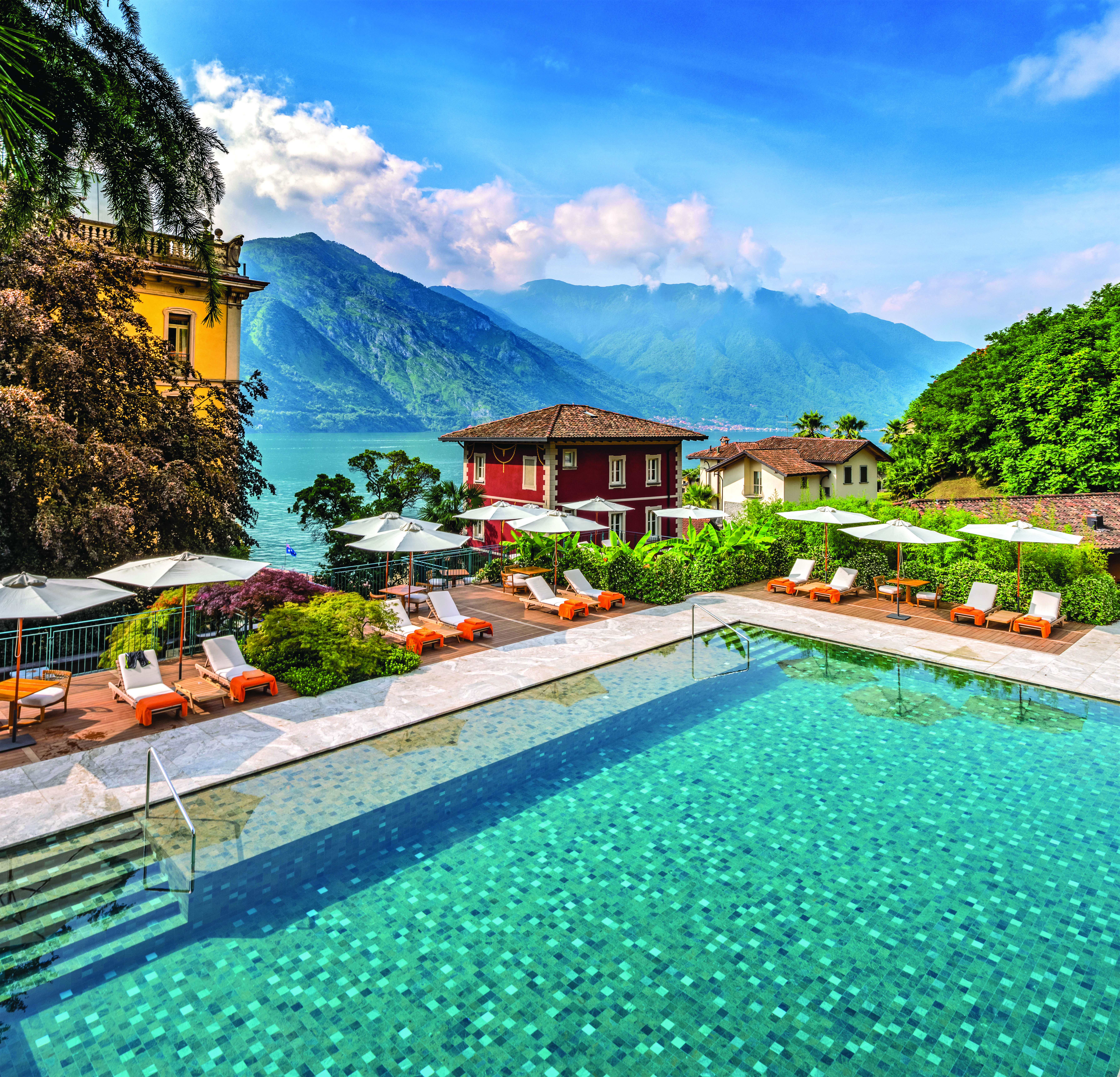Grand Hotel Tremezzo Lake Como pool sun loungers umbrellas lake in background