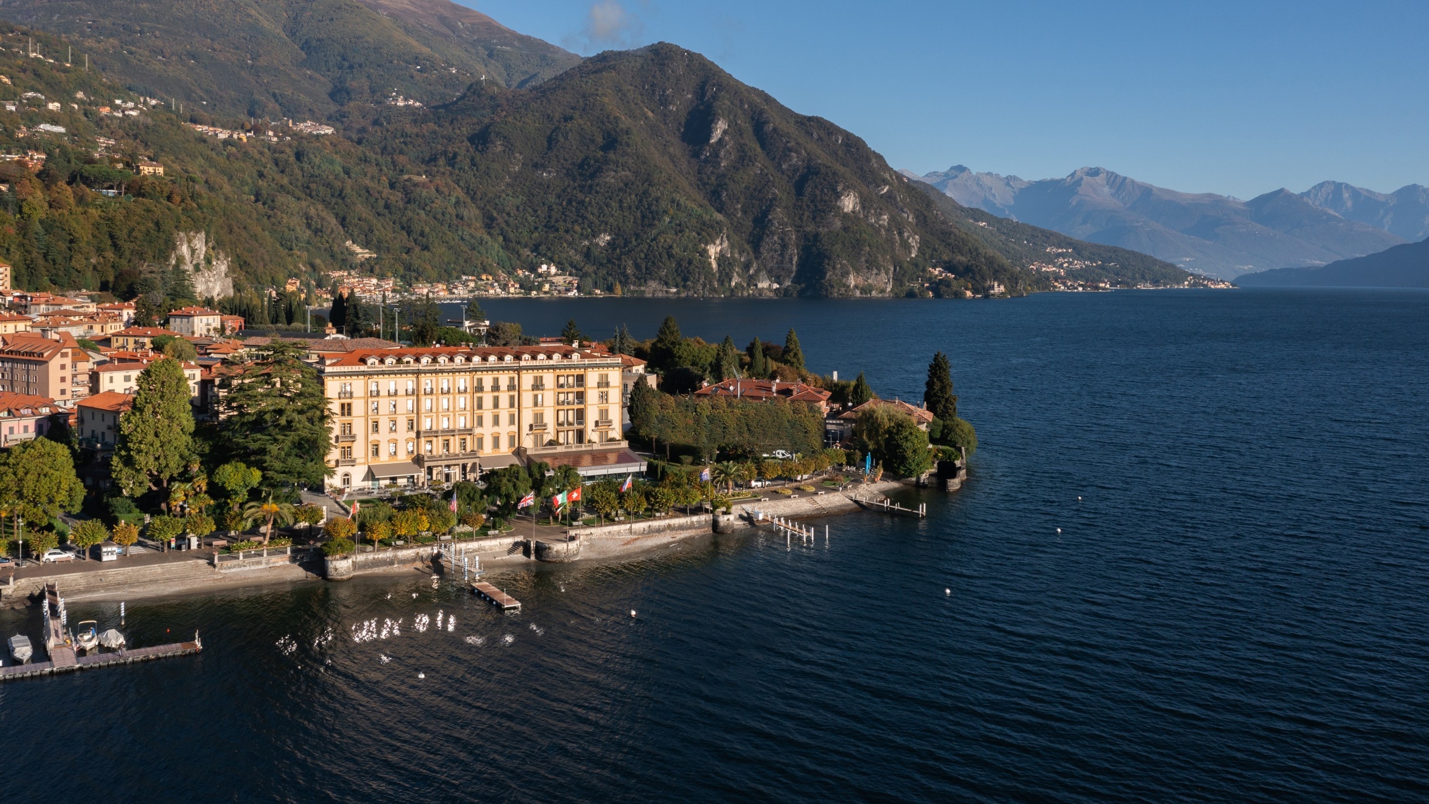 Grand Hotel Victoria Concept & Spa impressive ochre stone facade looking out across the lake waters