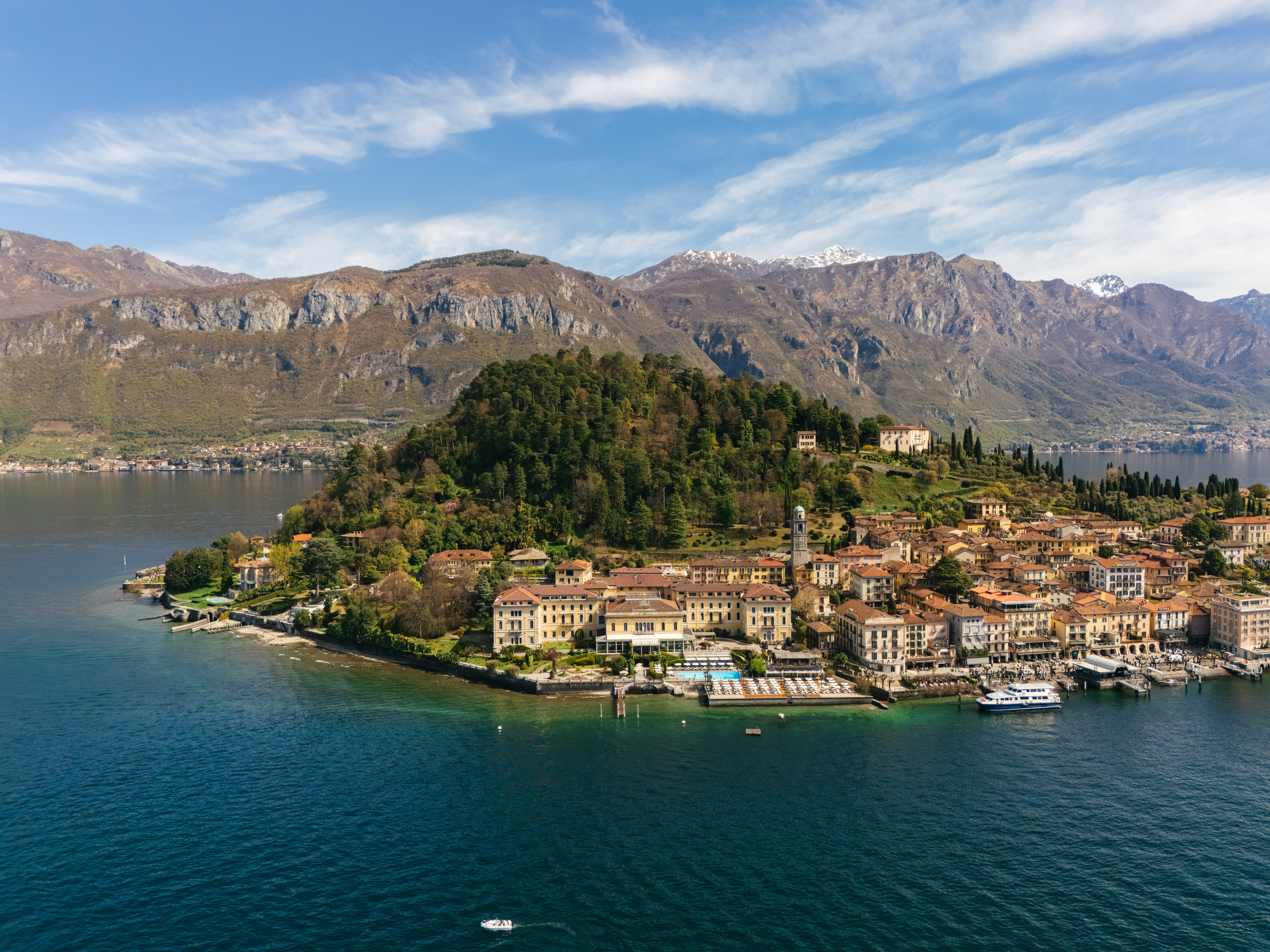 Grand Hotel Villa Serbelloni panoramic view from above Lake Como looking towards the hotel on the headland