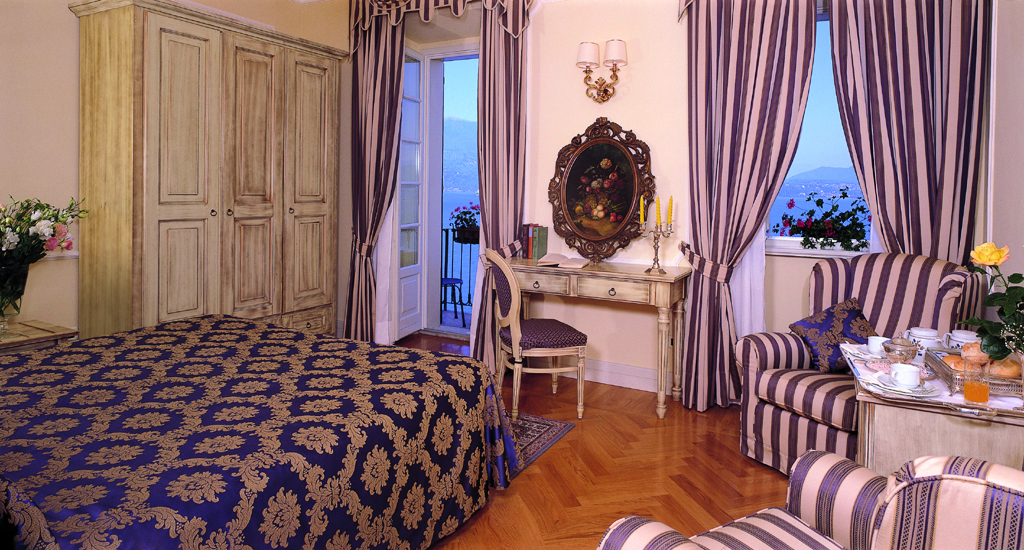 Hotel Cannero Lake Maggiore junior suite interior bed desk armchairs ornate décor