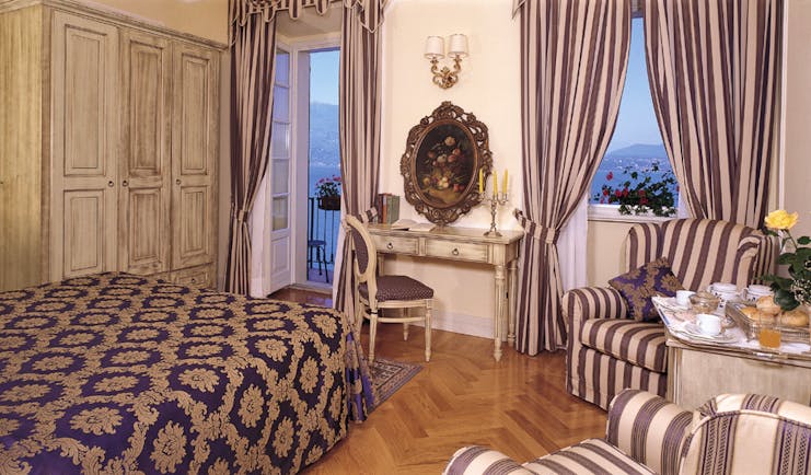 Hotel Cannero Lake Maggiore junior suite interior bed desk armchairs ornate décor