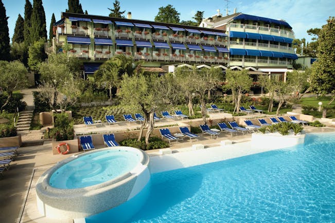 Hotel Olivi Lake Garda exterior hotel and pool sun loungers trees