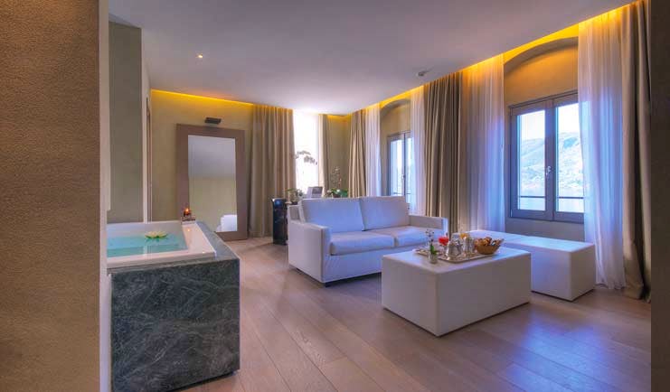 Hotel San Rocco Lake Orta deluxe suite chic minimalist décor stand alone bath tub windows