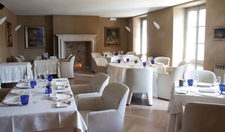 Hotel San Rocco Lake Orta fine dining tables chairs restaurant modern décor