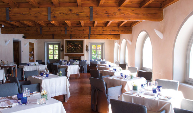 Hotel San Rocco Lake Orta restaurant indoor dining area tables chairs modern décor