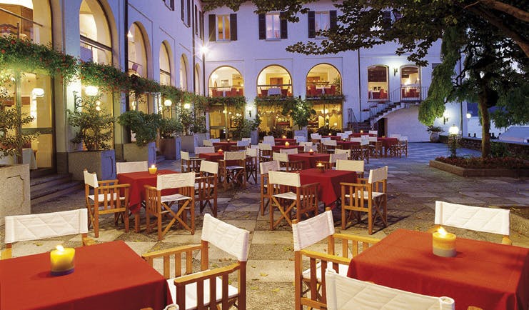 Hotel San Rocco Lake Orta terrace dining patio tables chairs trees