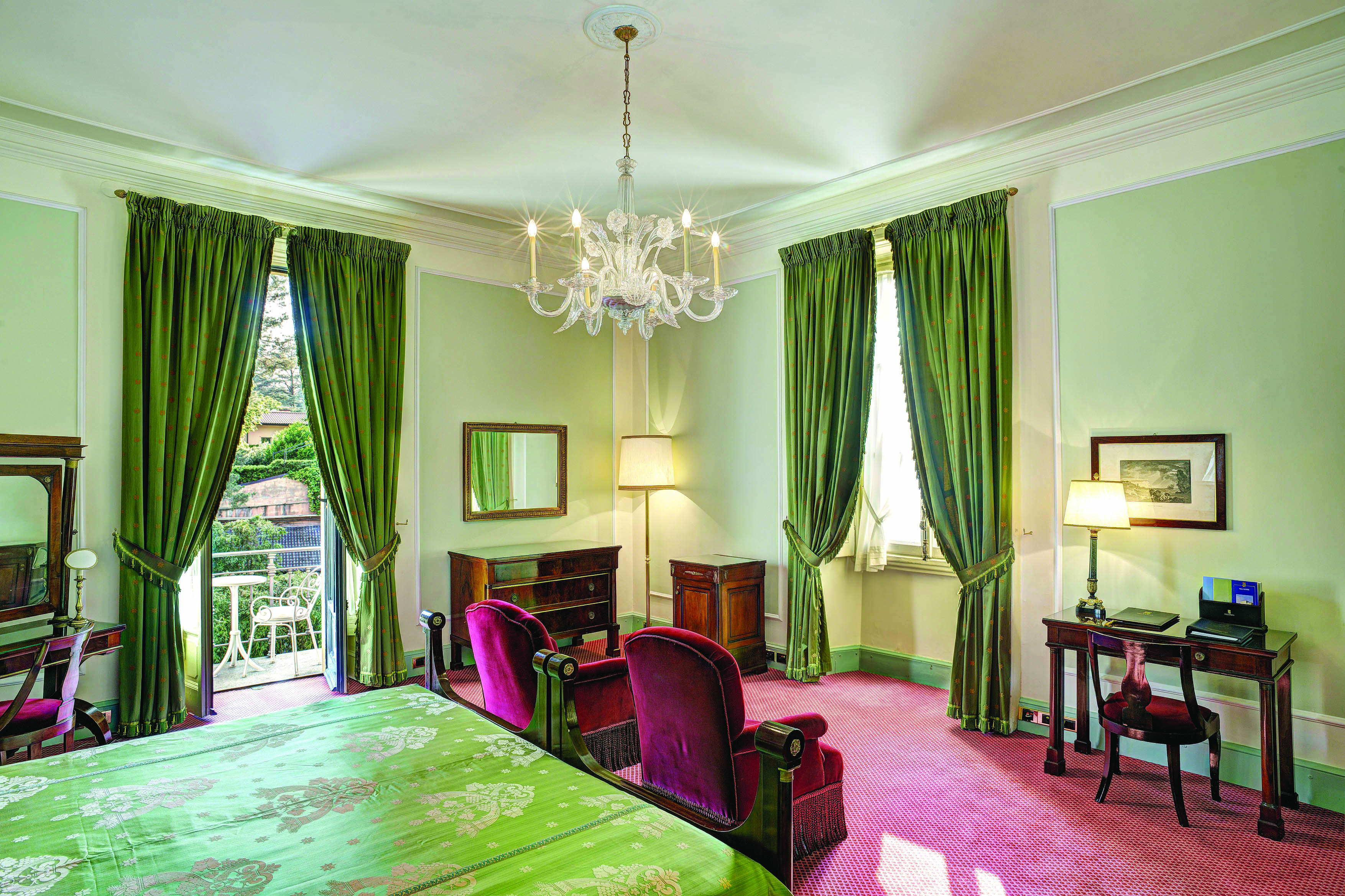 Villa d' Este Lake Como deluxe room traditional décor bed and seating area