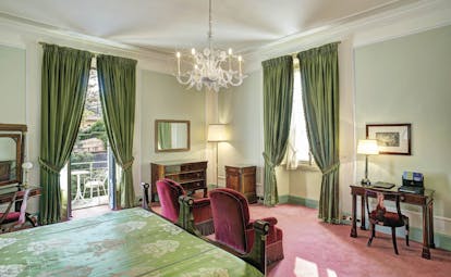 Villa d' Este Lake Como deluxe room traditional décor bed and seating area