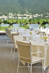 Villa d' Este Lake Como restaurant outdoor dining terrace overlooking the lake