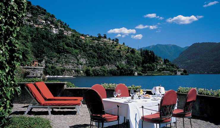 Villa d' Este Lake Como terrace sun loungers outdoor dining view of lake and surrounds